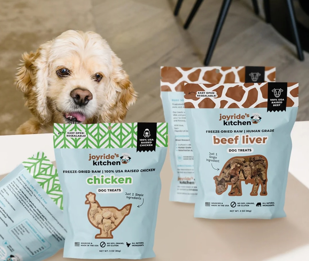 Joyride Kitchen hero banner showcasing premium freeze-dried dog food and treats with colorful packaging, highlighting natural ingredients and USDA certification against a clean white background
